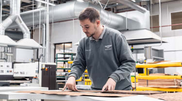 Bentley technician working at workbench